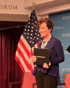 Photo of Patrice Kunesh receiving award