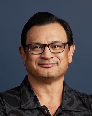 Headshot of Randall Akee.