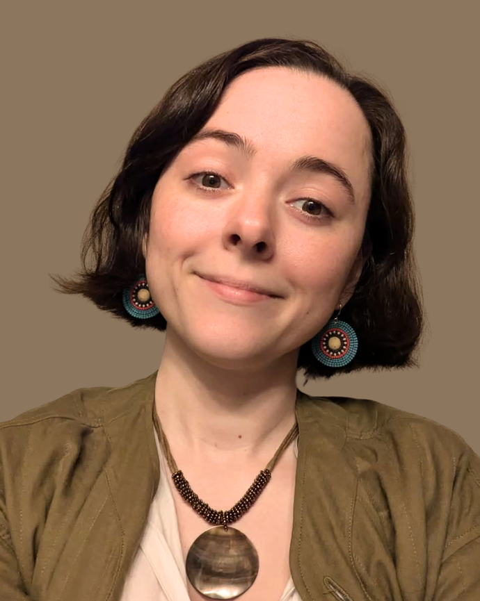 Female with shoulder length brown hair, headshot image